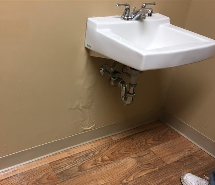 Water leak in a wall under a sink in West Orange, NJ