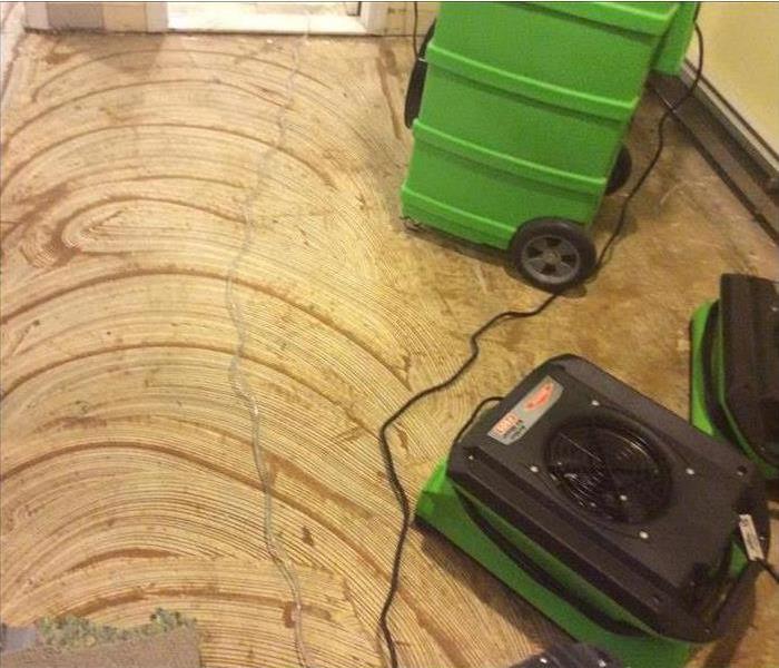 Drying equipment on the floor of a Montclair, NJ home