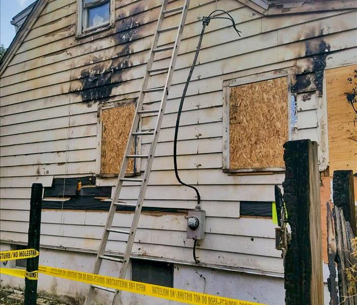 The outside of a fire damaged home in West Orange, NJ